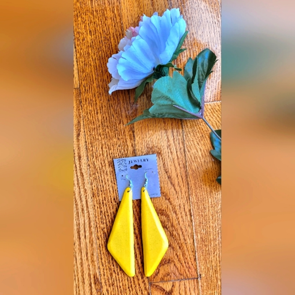Plus One New women's yellow wooden earrings. Never worn. 4.5 " with hook.